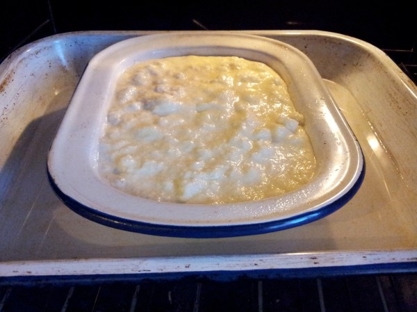 The pudding fits perfectly into a 600ml (just over 1 pint) capacity tin pie dish. The dish is 24 cm long.