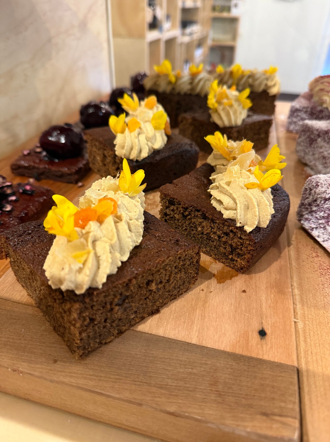 Gorse flowers help decorate Augustines of Portobello Apricot Ginger Cake.